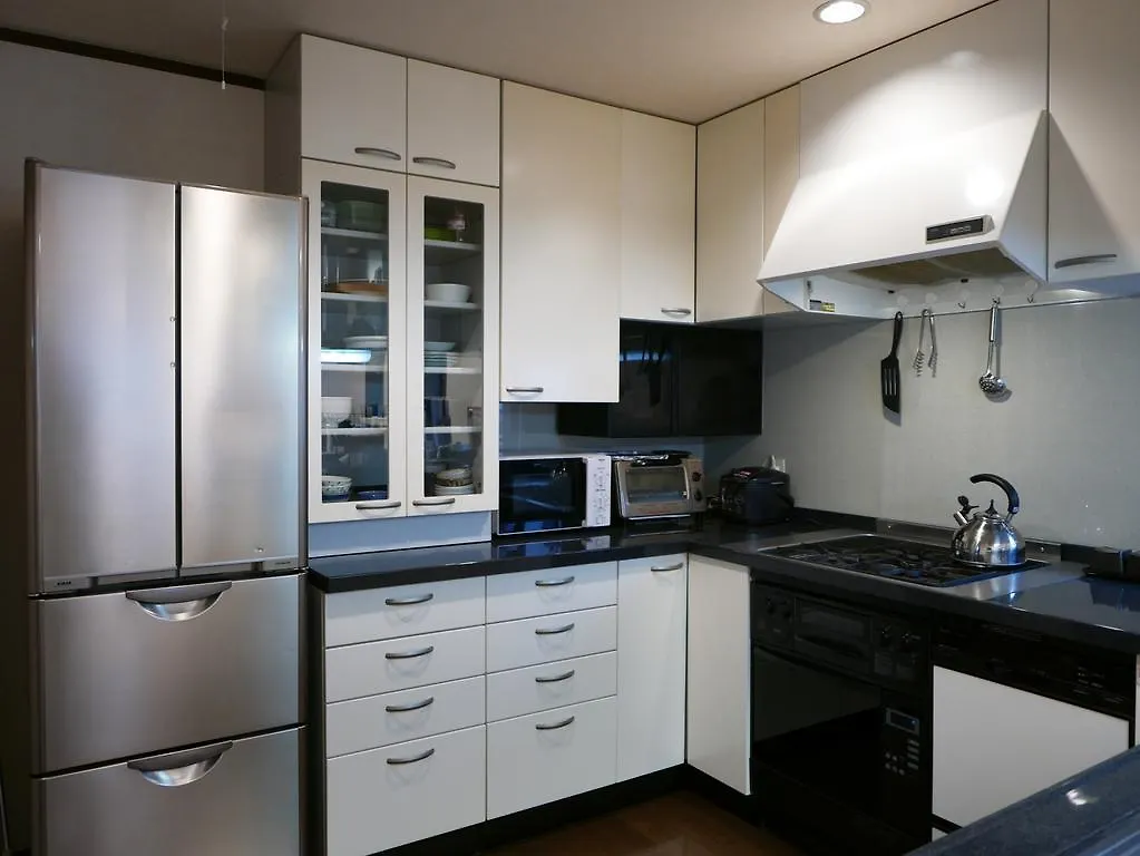 Проживание в семье Отель Tokyo Oc House Shibuya